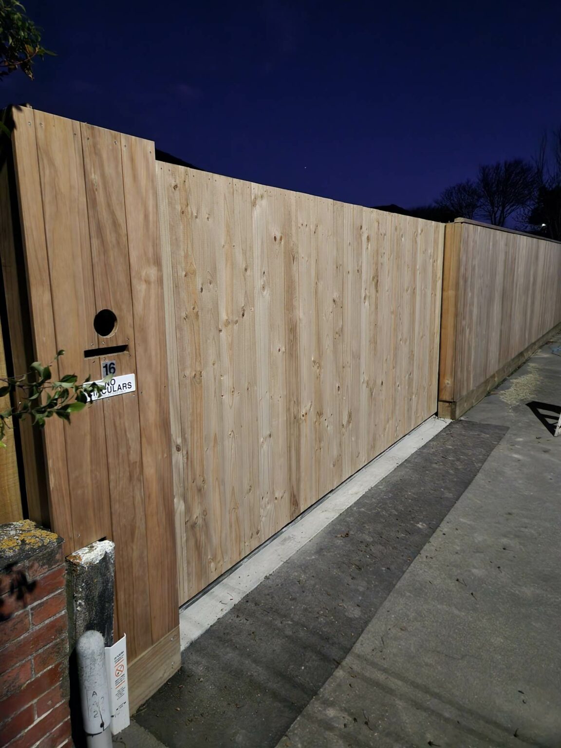 Timber clad roller gate